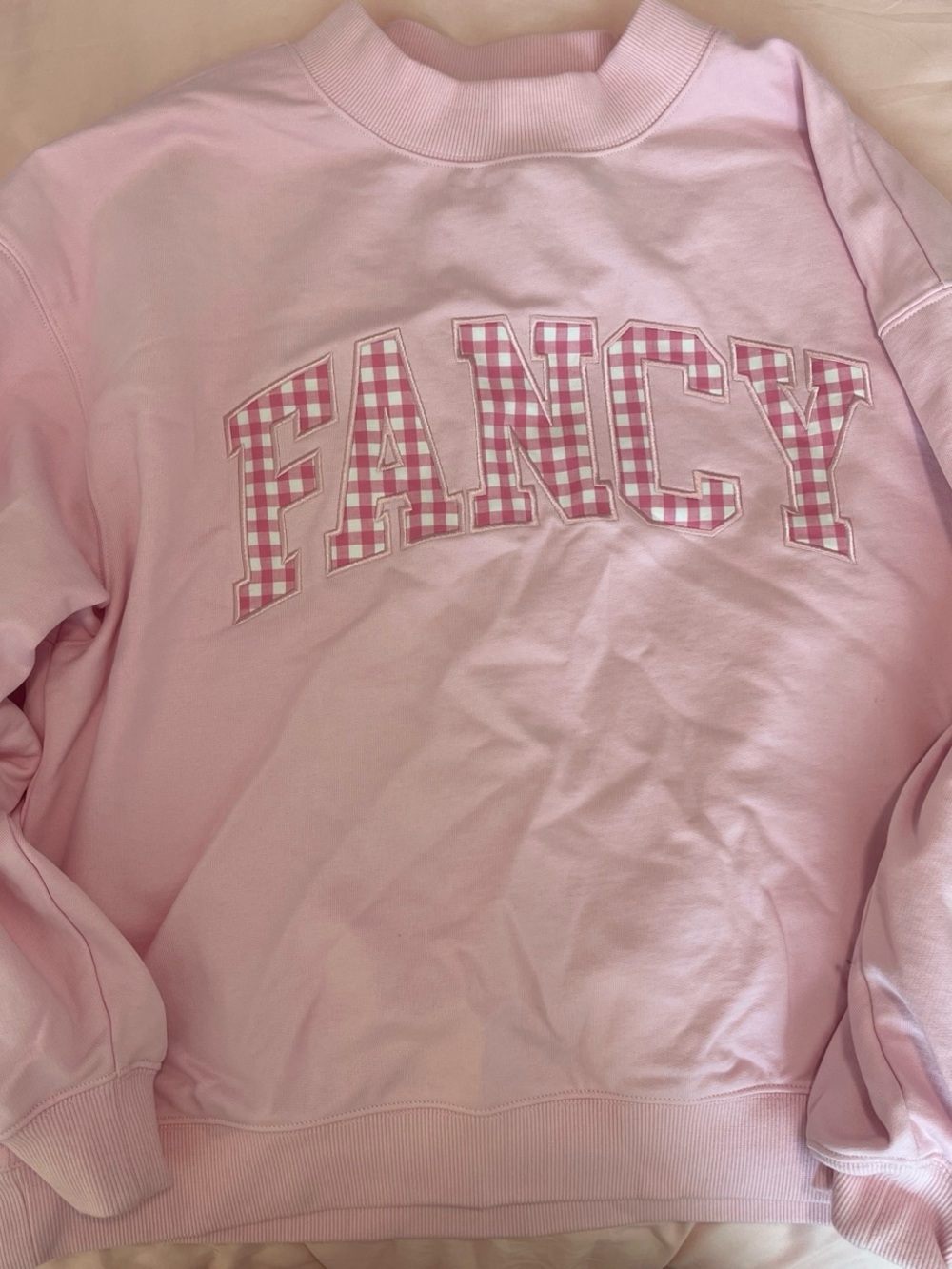 Shop Fancy pink gingham mockneck